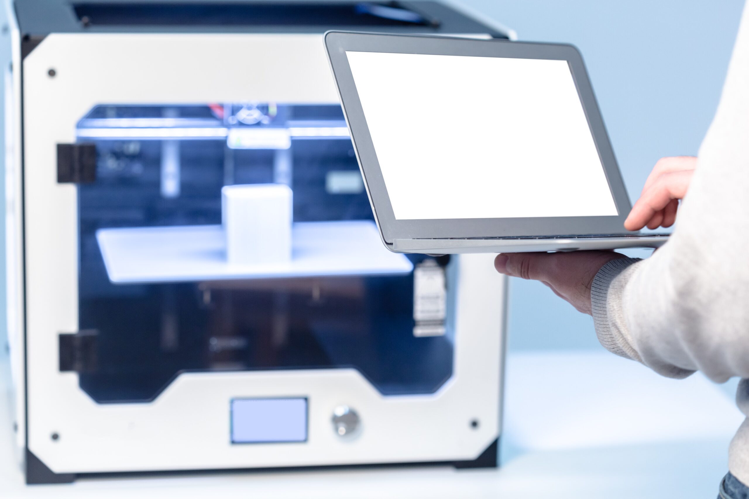 Designer Working With 3D Printer