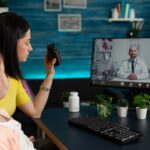 Mother discussing pills treatment against kid disease with remote therapist