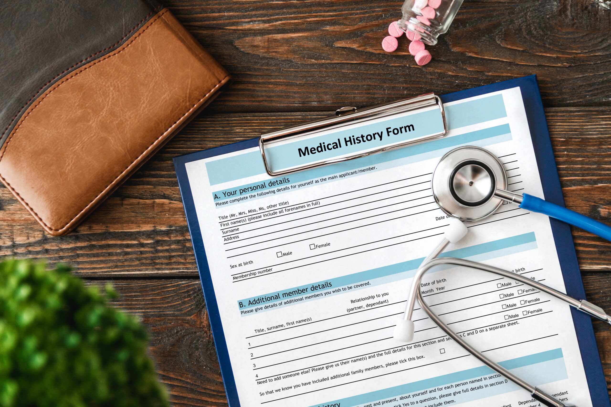 Patient medical history on a clipboard with stethoscope